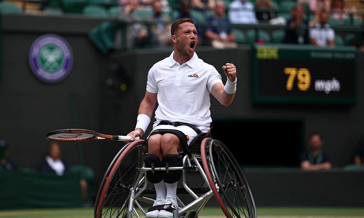 Alfie Hewett gives a roar in celebration during the wimbledon wheelchair men's singles final