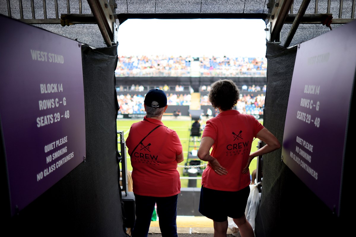 Two female volunteers watching the tennis at Rothesay Classic Birmingham.